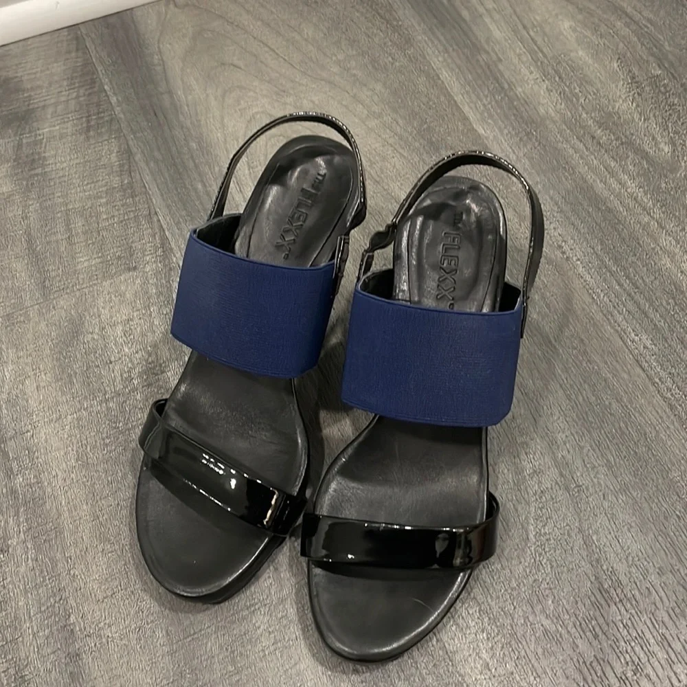The Flexx blue & black give a lot wedge sandals size 9